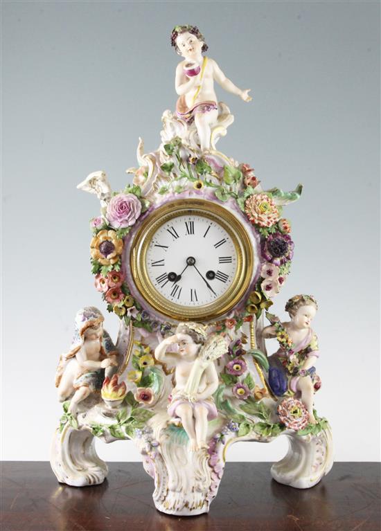 A late 19th century German porcelain mantel clock, 18in.